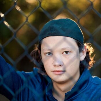 Blake Senior Portraits on a Tennis Court